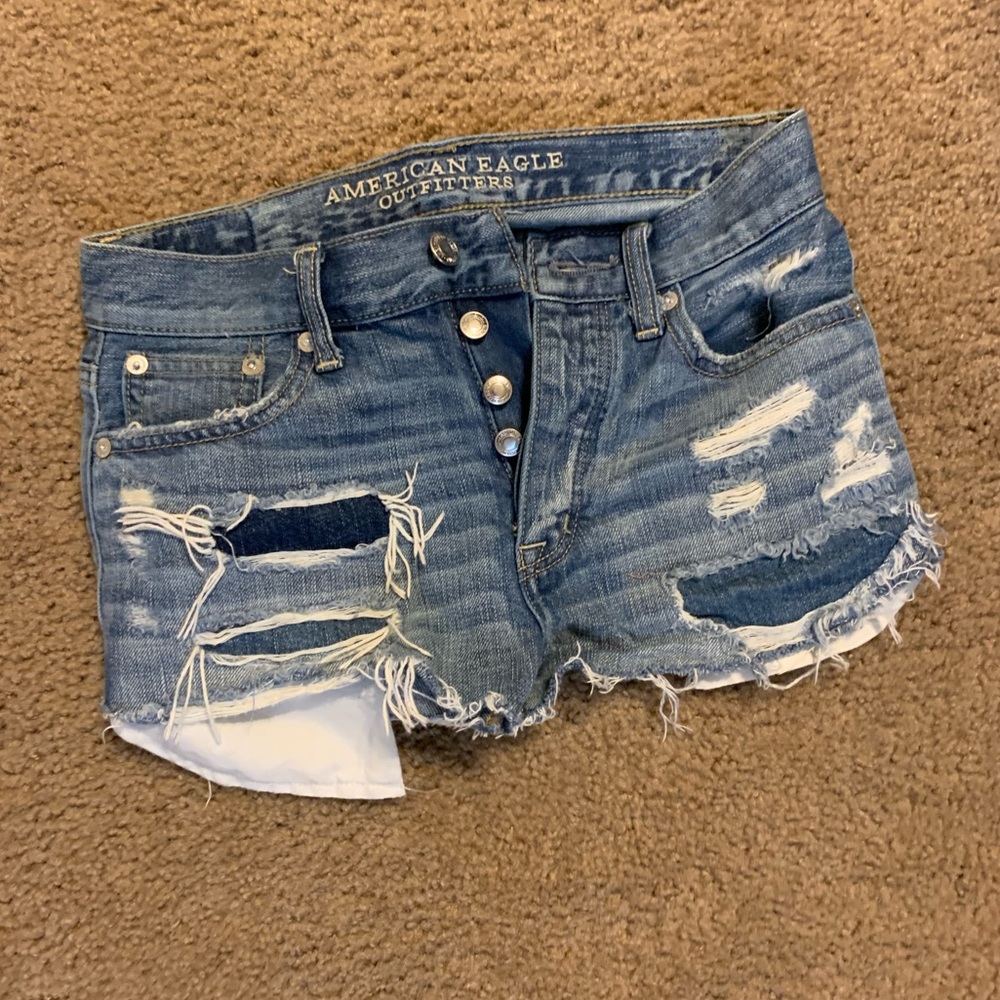 Vintage hi rise festival distressed denim shorts